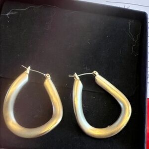 Brushed faux gold tone squiggle pierced hoop earrings